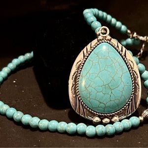 Ladies handcrafted sterling and turquoise necklace.